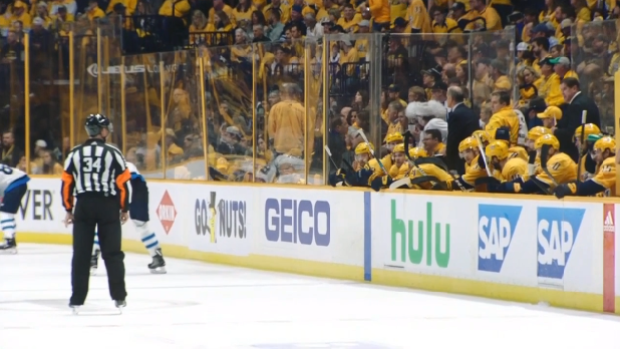 A heated exchange is caught between Preds head coach peter Laviolette and a referee.