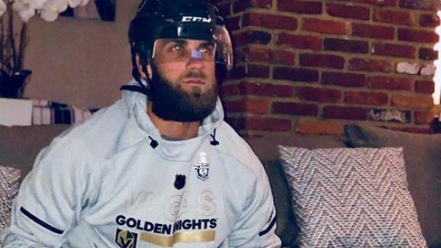 Bryce Harper, wearing a Golden Knights jersey, looked demoralized