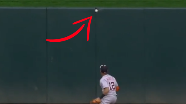 Twins Brian Dozier got a baseball stuck in the outfield padding