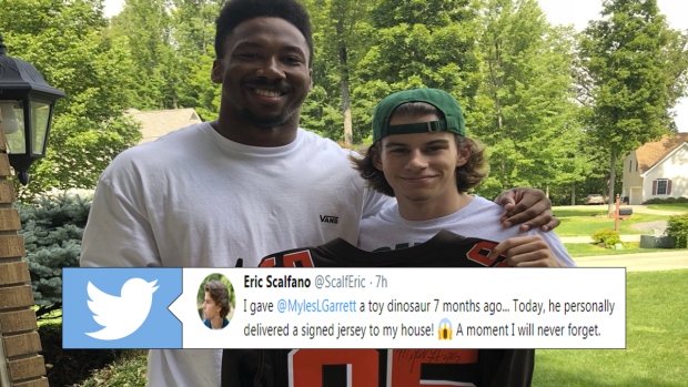 Myles Garrett Gives Browns Fan Jersey in Exchange for Toy Dinosaur