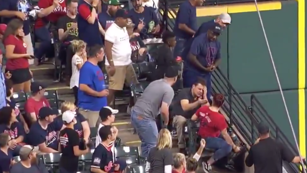 This baseball fan took a foul ball right to the head Wednesday night ...