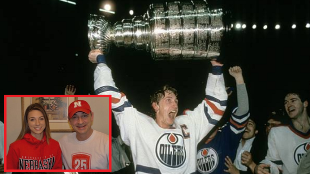 Wayne Gretzky hoists the Stanley Cup.