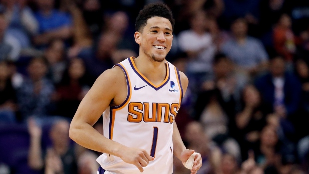 Suns' Devin Booker leaves game with hamstring injury - The San