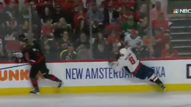 Dougie Hamilton dodges Alex Ovechkin