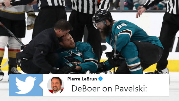 Joe Pavelski is helped by teammates after suffering a head injury in Game 7 of round 1.