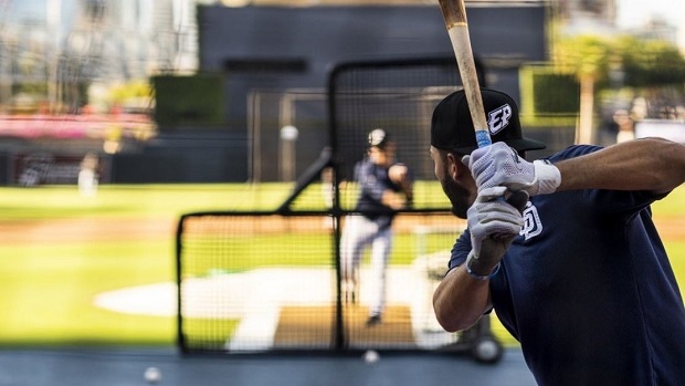 San Diego Padres wear El Paso hats during batting practice