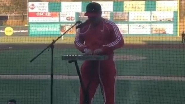 Bat boy performs before his final game