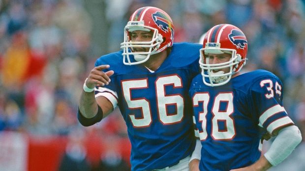 Jim Kelly honors Darryl Talley, former Buffalo Bills teammate, by wearing  No. 56 jersey before game - ESPN