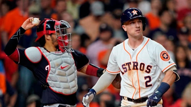 Astros' Alex Bregman exits World Series with injury in last at-bat