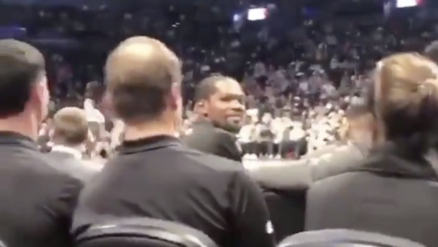 Kevin Durant smiles at fan