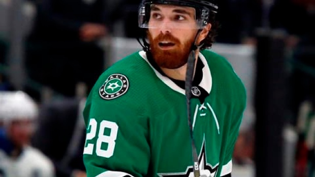 Headache-plagued Stephen Johns finally back on ice for Stars Article Image 0