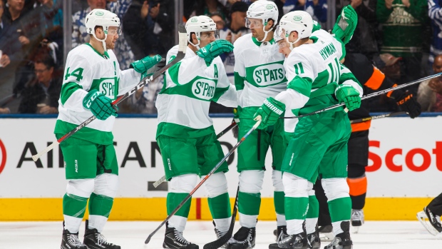 Toronto Maple Leafs donating green and white jerseys to frontline
