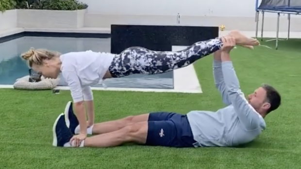 Ilya and wife working out at home