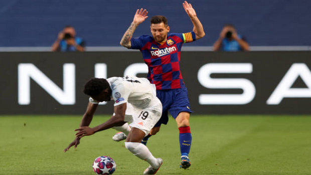 Alphonso DAVIES, FCB 19 Lionel Messi, PSG 30 change jersey after the eighth  finals match PARIS SG - FC BAYERN MUENCHEN 0-1 of football UEFA Champions  League, match in season 2022/2023 in