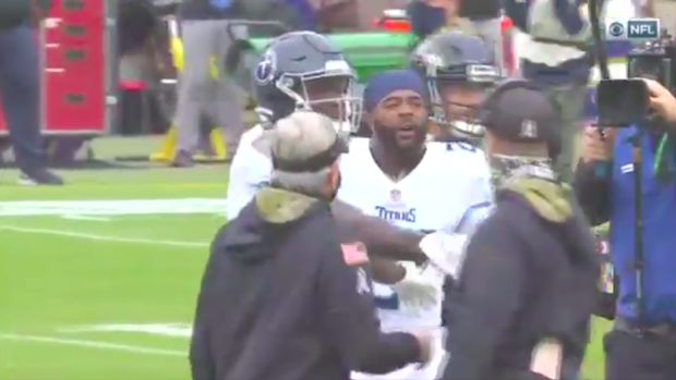 John Harbaugh, Malcolm Butler trade barbs pregame before Titans-Ravens