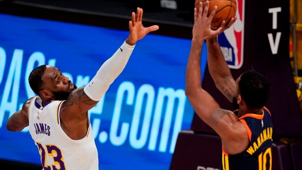 LeBron James dazzles with triple-double as Lakers top Knicks in OT