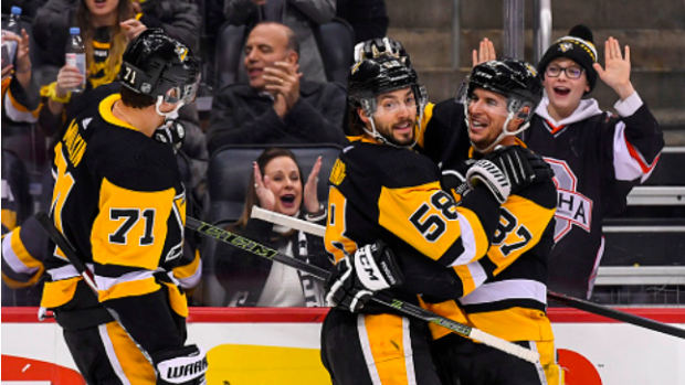 Evgeni Malkin, Sidney Crosby and Kris Letang