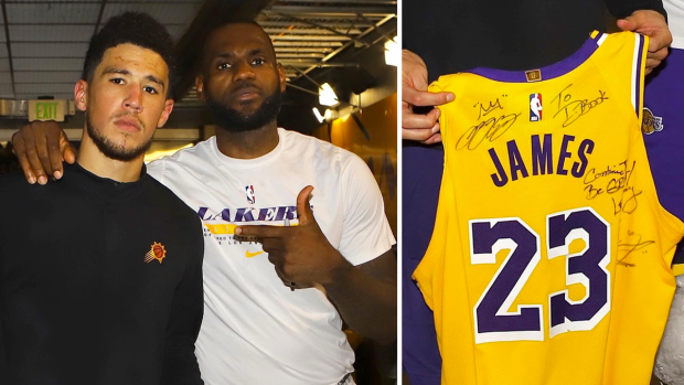 LeBron James congratulated Devin Booker post-game with a signed