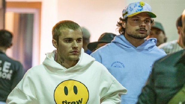Justin Bieber proudly bears his Drew House brand during the UFC 263 fight  in Arizona
