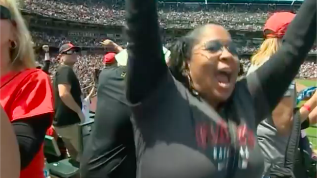 Emily Wade reacts to LaMonte Wade Jr.'s home run