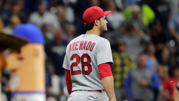 Cardinals not concerned after Arenado exits with back tightness