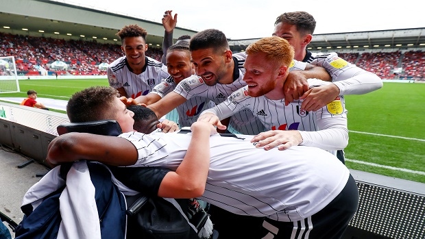 Fulham FC players celebrate their goal with Rhys