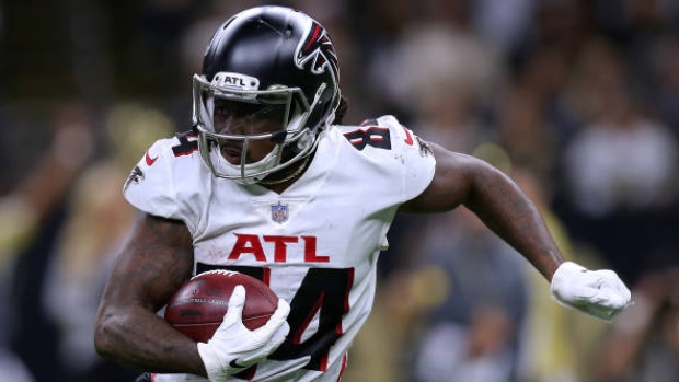 Atlanta Falcons players celebrate a touchdown by Atlanta Falcons running  back Cordarrelle Patterson during the first half of an NFL football game  against the Chicago Bears, Sunday, Nov. 20, 2022, in Atlanta. (