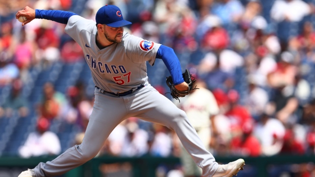 Happ leads homer barrage, Cubs power past struggling Reds