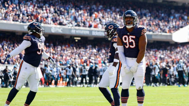 DeMarcus Walker and Bears celebrate