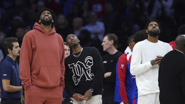 Joel Embiid and Paul George 