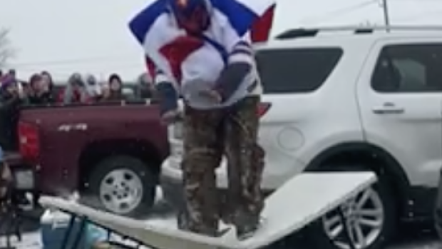 Bills fan suffers gruesome leg injury jumping through a table from the roof  of a truck - BarDown
