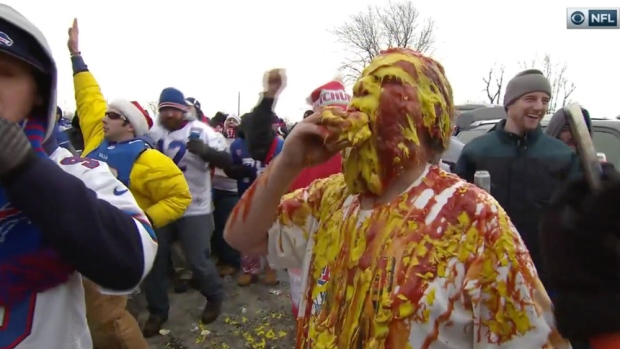 Bills' fan gets showered in mustard and ketchup because Bills