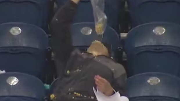 drunk football fan popcorn gif