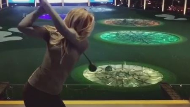 Paulina Gretzky shows off her impressive golf swing.