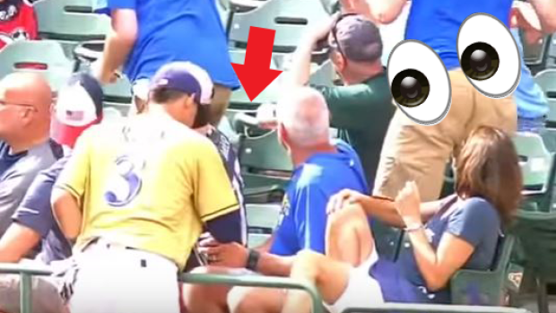 Brewers shortstop Orlando Arcia sneakily ate some of a fan's ice