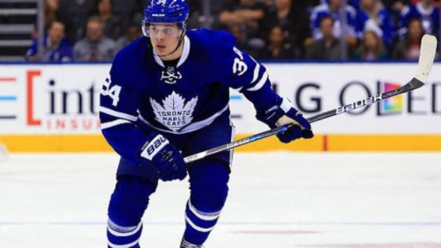 Auston Matthews #34 of the Toronto Maple Leafs skates during an NHL preseason game.