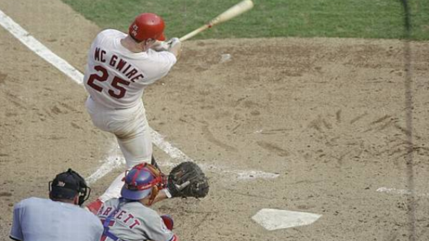 Mark McGwire became the first player in MLB history to reach 70 home runs during the 1998 season.