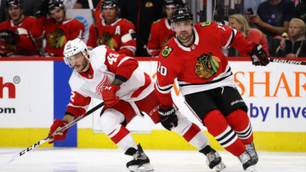 Martin Frk and Patrick Sharp during a 2017 NHL preseason game.