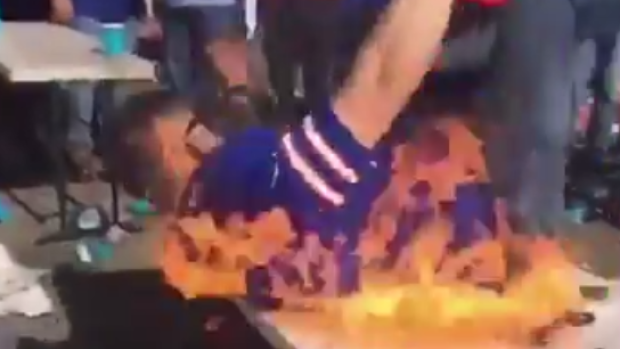 Bills Mafia Fan Smashing Table Caught On Fire GIF