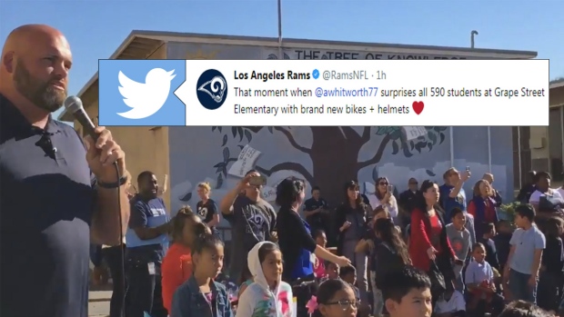 Andrew Whitworth surprises entire school with new bikes and helmets