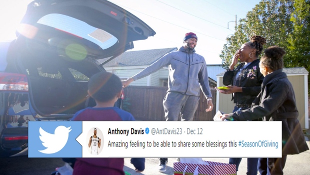 Anthony Davis surprises a family with presents and a car