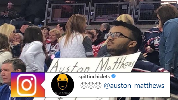 A fan holds an interesting Auston Matthews sign at a Columbus Blue Jackets game.